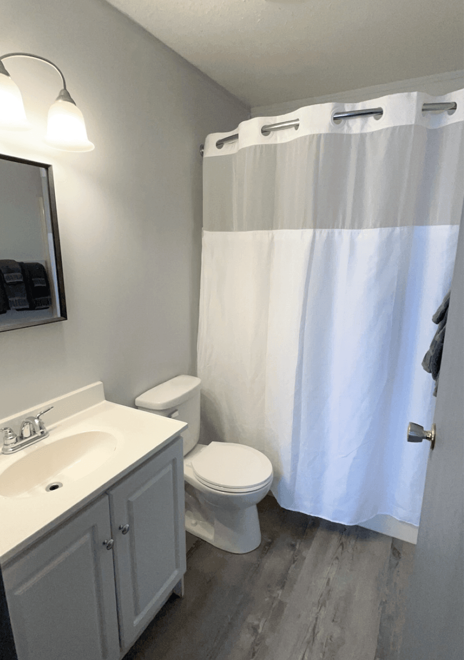 Cleans bathrooms at Wolfe Den Inn & Suites